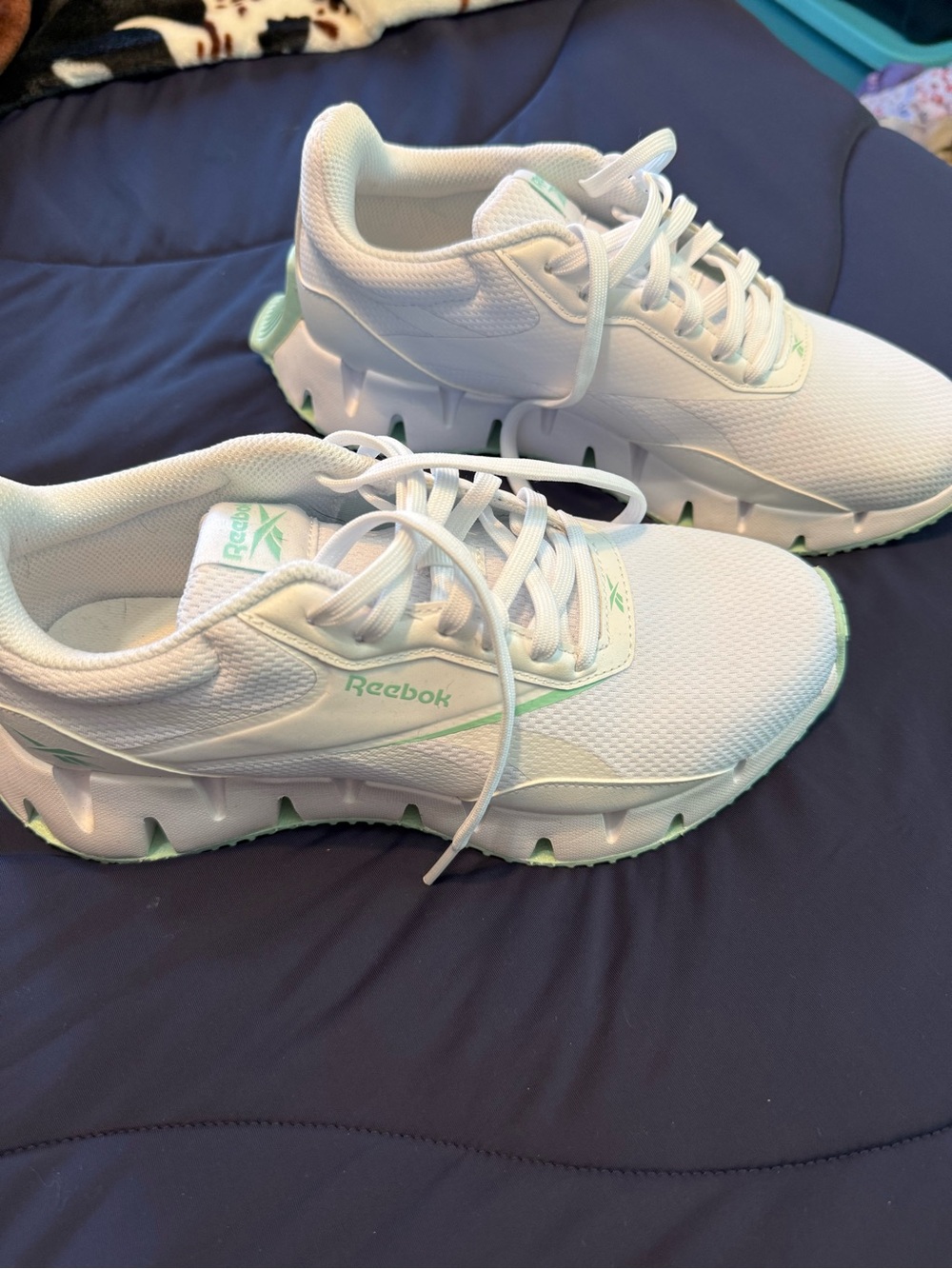 White and mint green Reeboks
